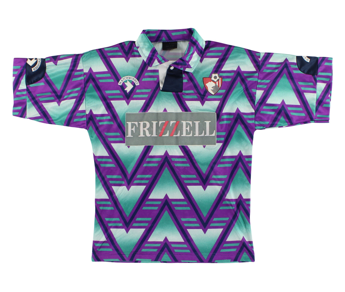 A vintage-style rugby shirt with a bold geometric zigzag pattern in purple, teal, and white. It features a dark navy collar, a gray 'FRIZZELL' sponsor logo on the chest, and two team crest patches on the upper chest.